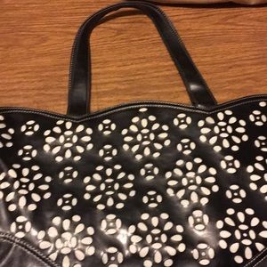 Faux leather cutaway handbag
